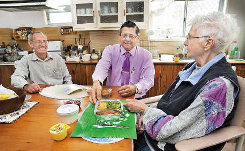 Beryl Beckmann, 85, was surprised to find Hervey Bay Meals on Wheels president Ray Fleming (left) and MP Ted Sorensen at her front door yesterday. Beryl Beckmann, 85, was surprised to find Hervey Bay Meals on Wheels president Ray Fleming (left) and MP Ted Sorensen at her front door yesterday.